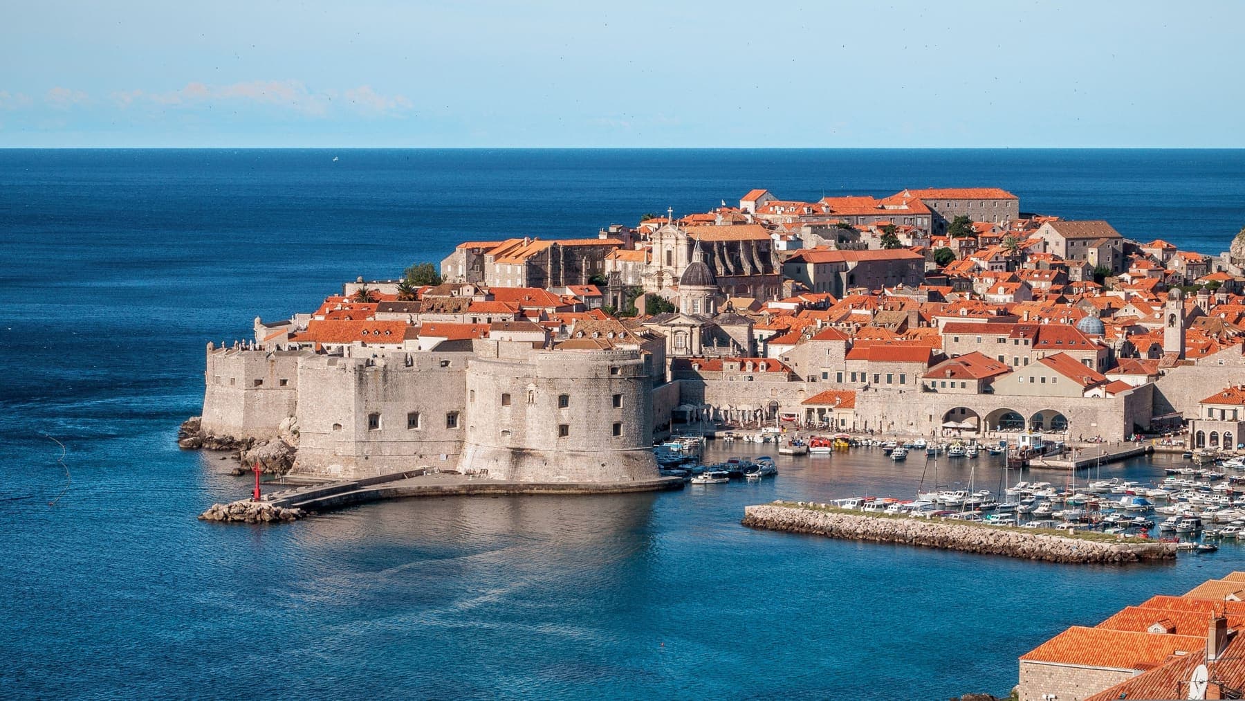 Dubrovnik old town walls and red roofs above the Adriatic Sea