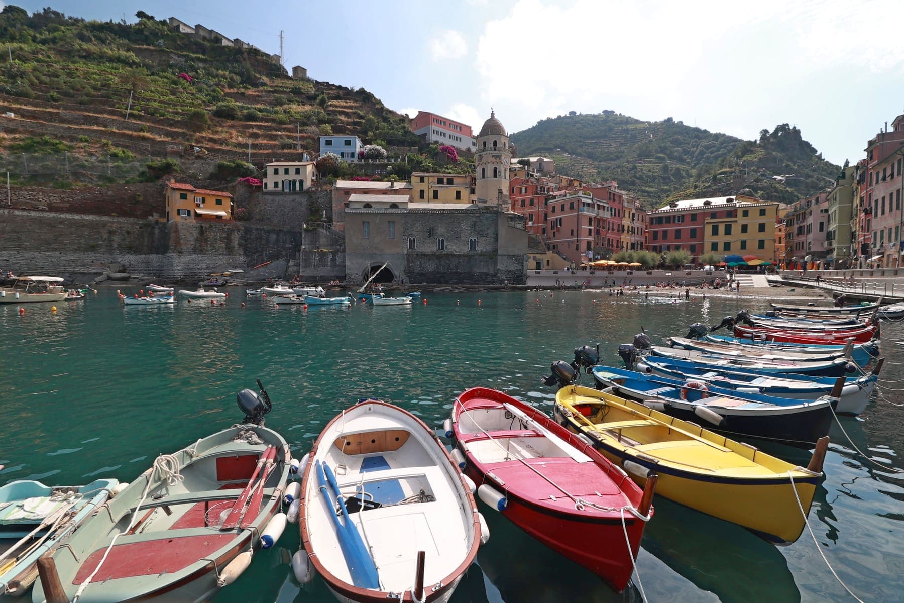 Colourful fishing boats in the small harbour of Vernazza